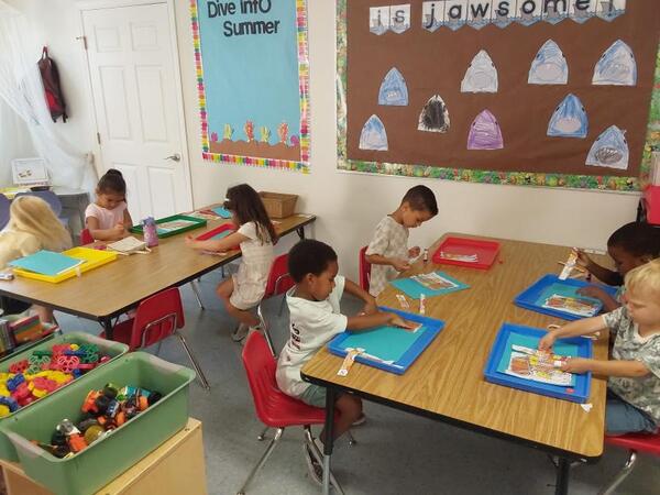 Children with puzzle